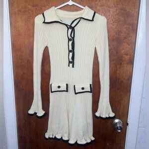 Cute vintage style knitted dress. It has never been worn before.